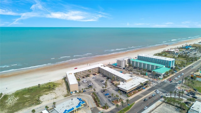 aerial view with a beach view and a water view