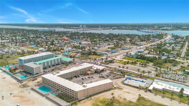 aerial view featuring a water view and a city view