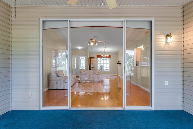 interior space featuring ceiling fan