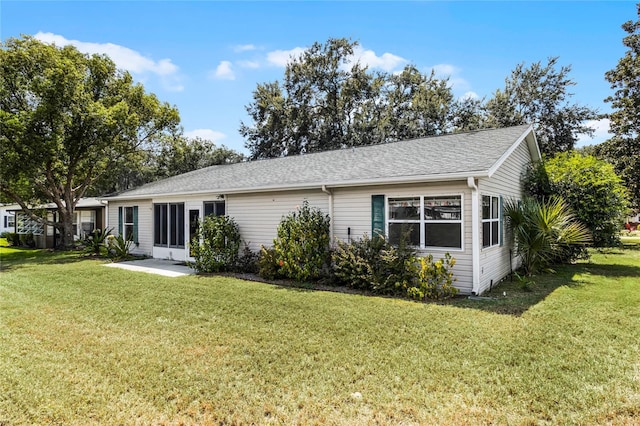 exterior space with a lawn