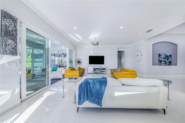 tiled living room with crown molding