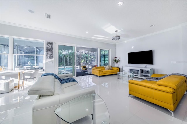 living room featuring light tile patterned floors and crown molding