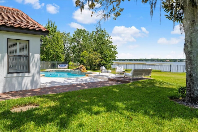 view of swimming pool with a patio area, a fenced backyard, a fenced in pool, and a yard