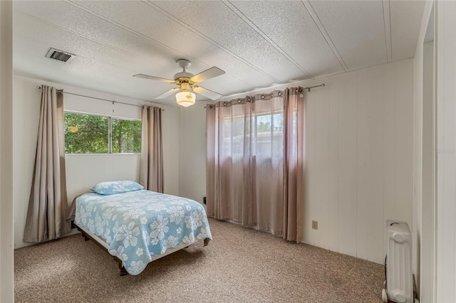 236 Peppertree Ct, Lake Mary, FL 32746 - bedroom with radiator, light colored carpet, ceiling fan, and a textured ceiling