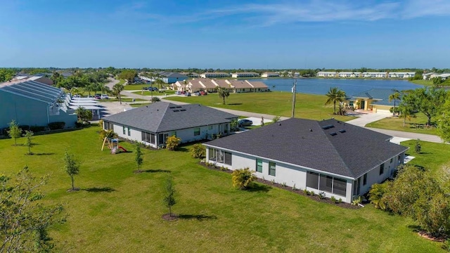 bird's eye view with a water view