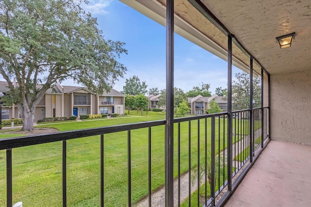 balcony featuring a residential view