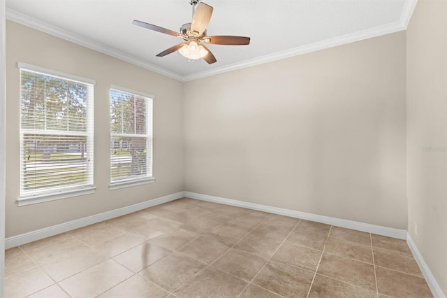 tiled spare room featuring ornamental molding and ceiling fan