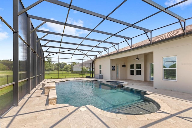 view of swimming pool featuring a lanai, a patio area, ceiling fan, and an in ground hot tub