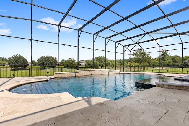 view of pool featuring a lanai and a patio