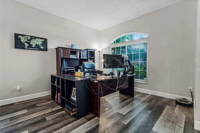 office space featuring dark hardwood / wood-style flooring and a textured ceiling