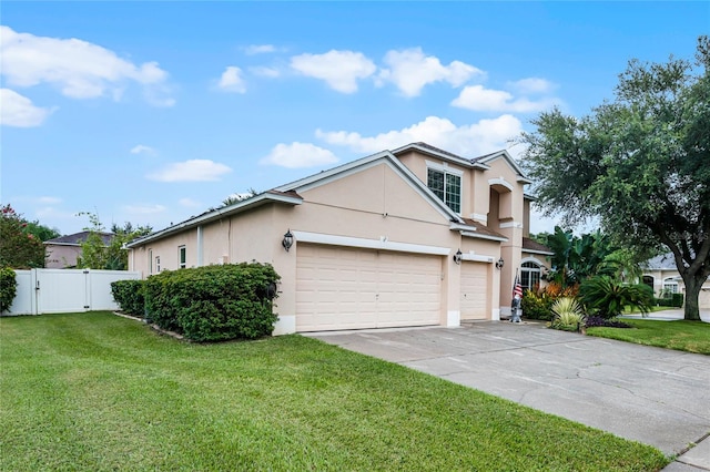 view of front facade featuring a front lawn and a garage