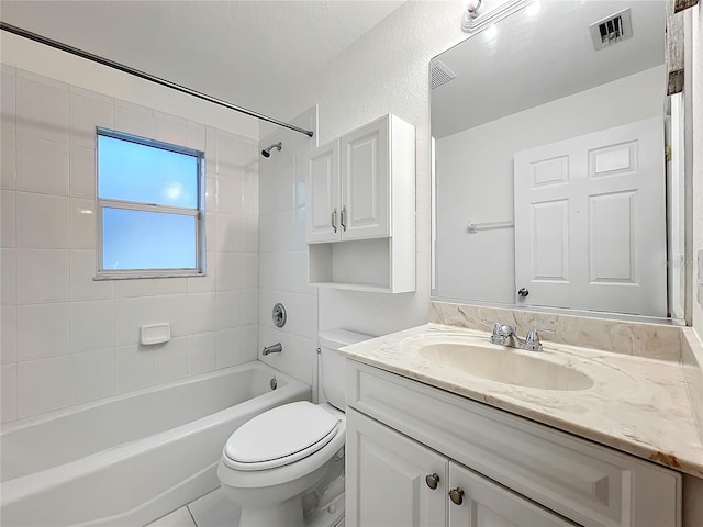 bathroom with  shower combination, visible vents, vanity, and toilet