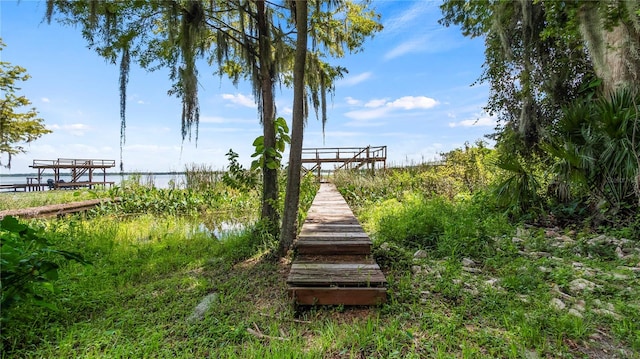 dock area featuring a water view