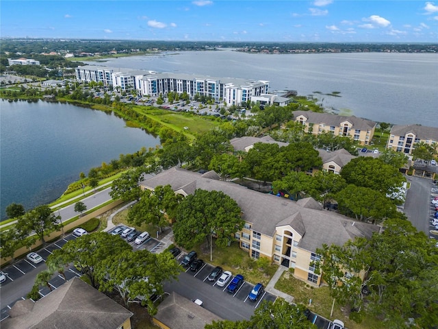 drone / aerial view with a water view