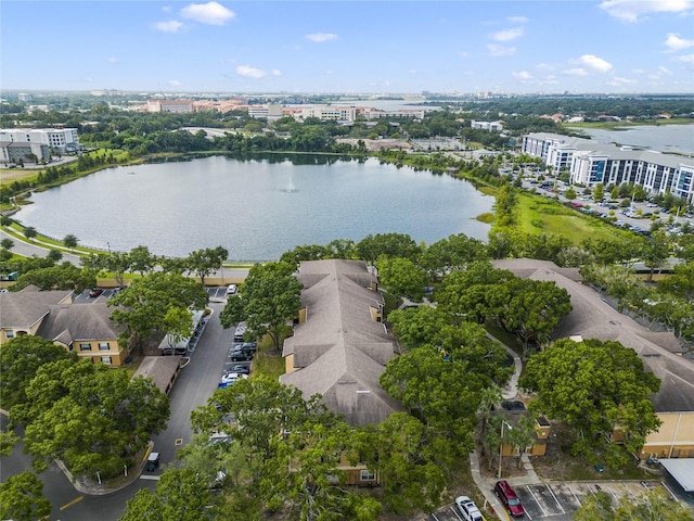 birds eye view of property with a water view