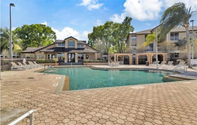 pool with a patio