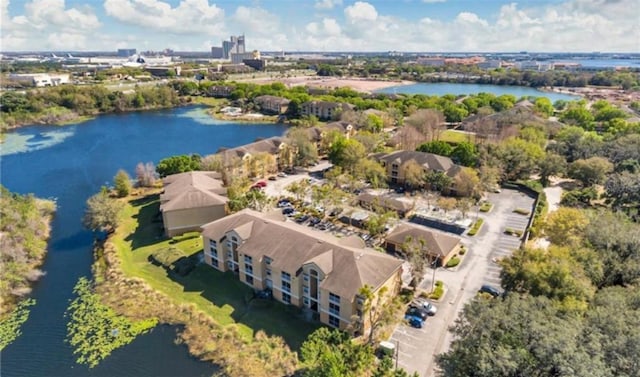 birds eye view of property featuring a water view
