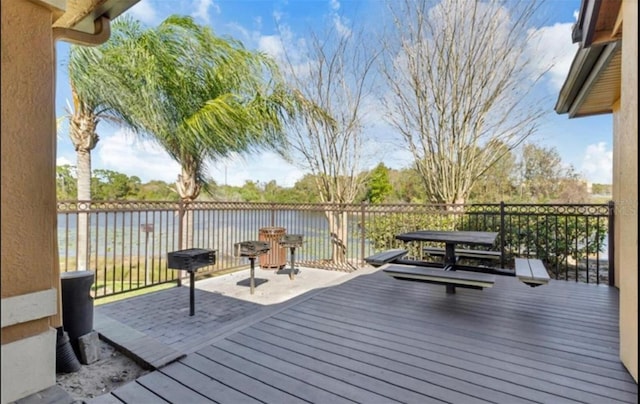 wooden terrace with a water view