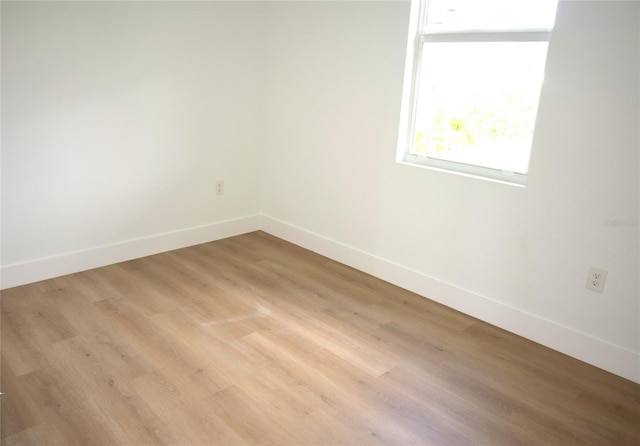 empty room featuring light hardwood / wood-style floors