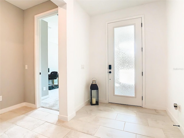 entryway featuring light tile patterned flooring