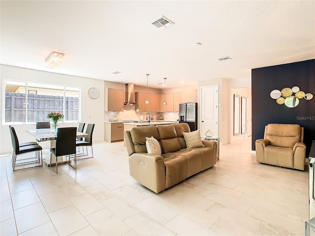 tiled living room with sink