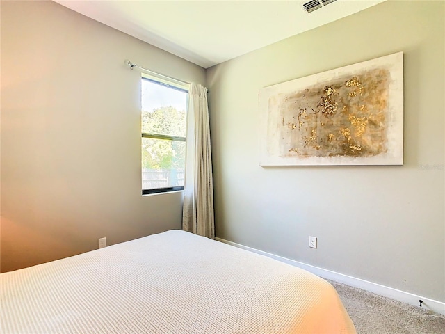 bedroom featuring carpet