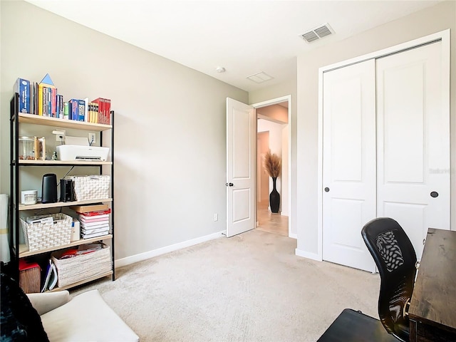 sitting room with light colored carpet