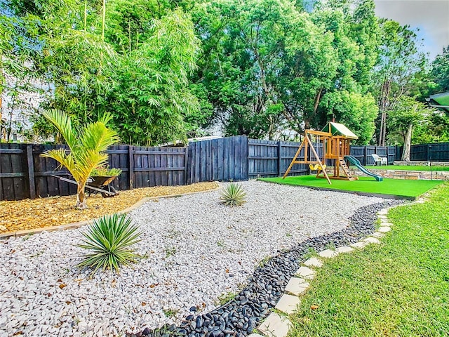 view of yard with a playground