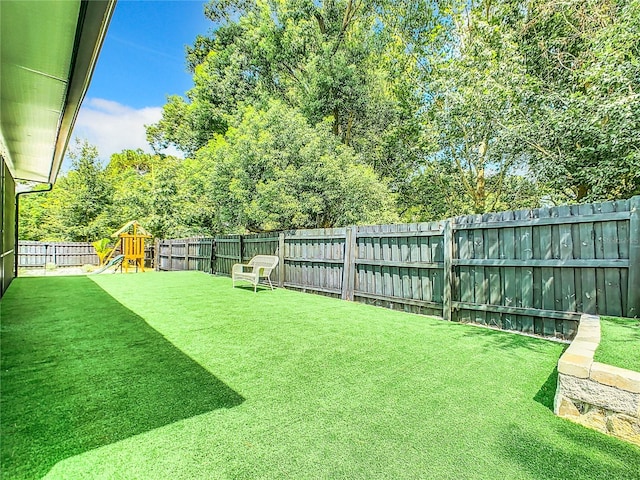 view of yard with a playground