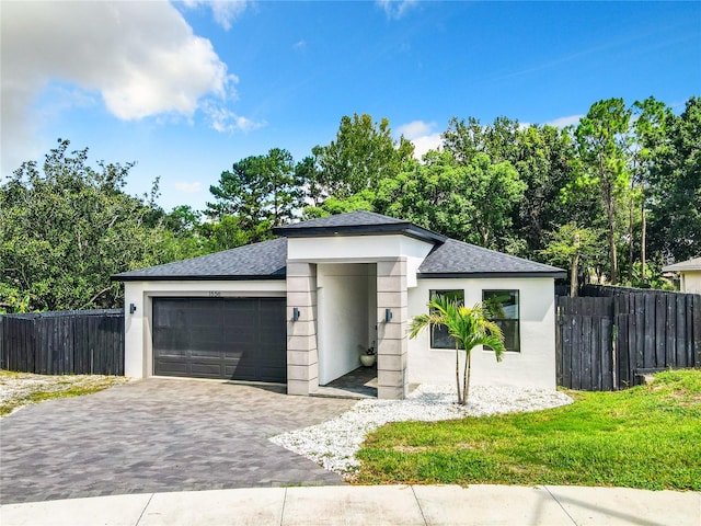 view of front of property featuring a garage