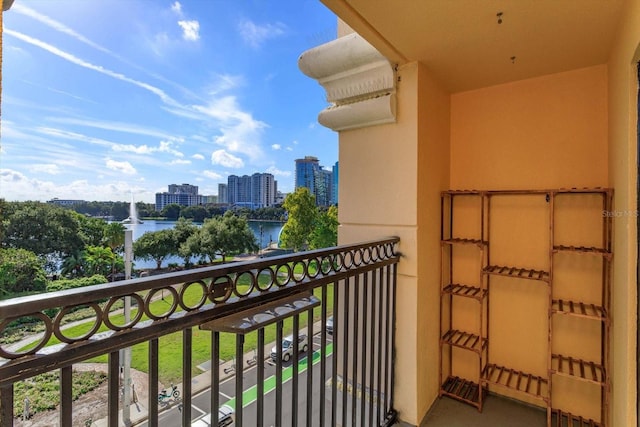 balcony featuring a water view