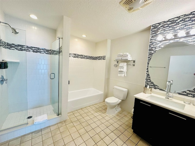 bathroom with visible vents, toilet, a textured ceiling, a shower stall, and vanity