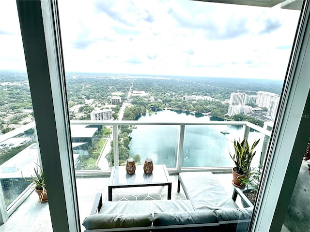 balcony featuring a water view