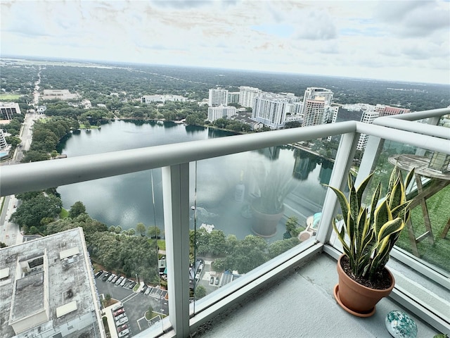 balcony featuring a water view