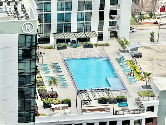 view of swimming pool with a patio