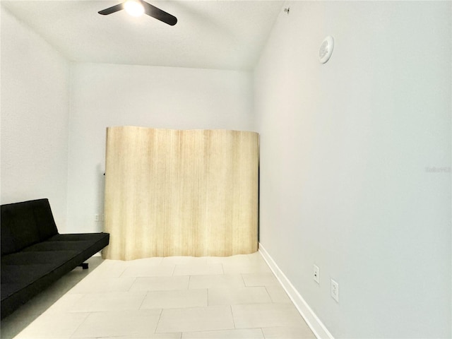 bedroom featuring ceiling fan and light tile patterned floors