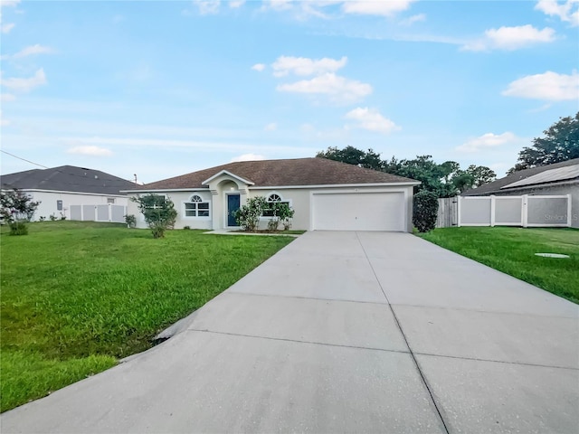 single story home with a front lawn and a garage