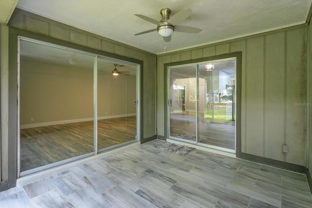 interior space featuring ceiling fan and light wood-type flooring