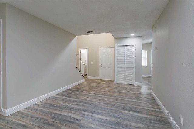 empty room with wood-type flooring