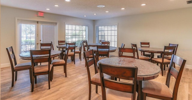 dining room with light wood-type flooring