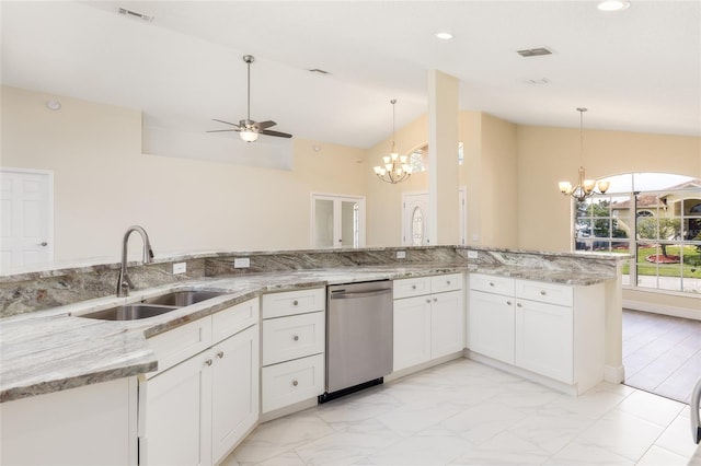 kitchen with light tile patterned floors, ceiling fan with notable chandelier, sink, and dishwasher