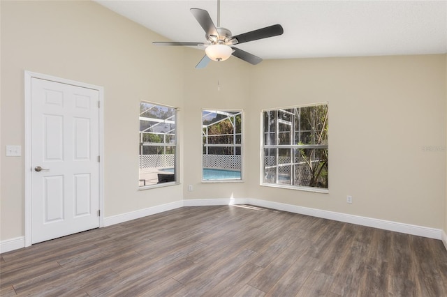 spare room with ceiling fan, lofted ceiling, and hardwood / wood-style flooring