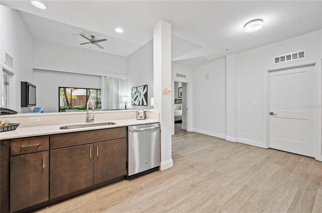 kitchen with ceiling fan, stainless steel dishwasher, light hardwood / wood-style flooring, dark brown cabinetry, and sink