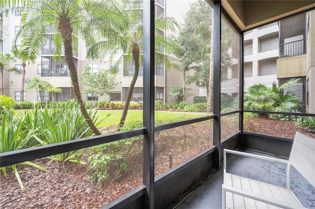 unfurnished sunroom featuring a healthy amount of sunlight