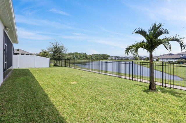 view of yard with a water view