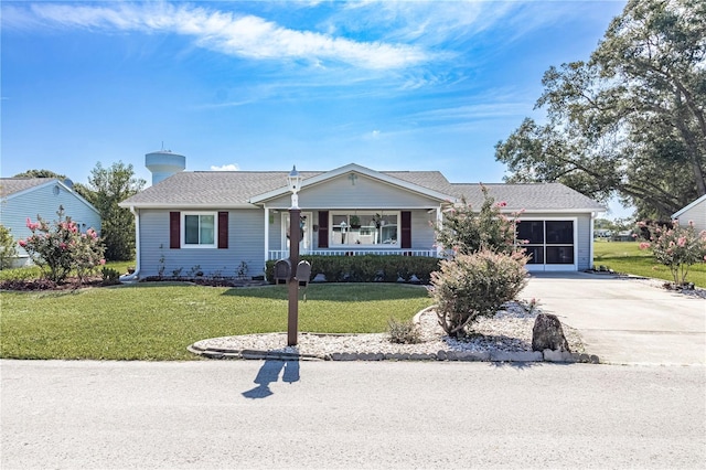 single story home with a porch and a front lawn