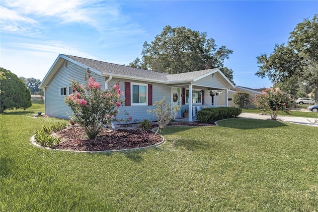 ranch-style home with a porch and a front yard