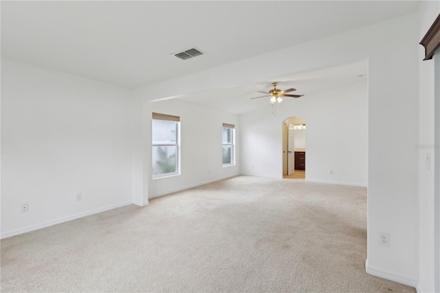 carpeted empty room with ceiling fan