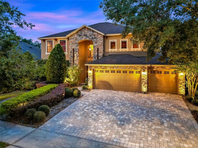 view of front of property featuring a garage