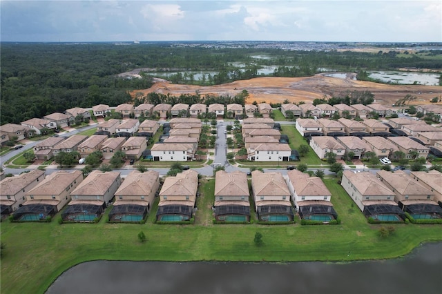 aerial view featuring a residential view and a water view